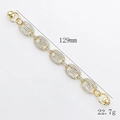 Golden alloy link bracelet encrusted with white rhinestones, length 129mm and 22.7g weight - Pave Rhinestone Gold