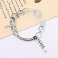 Blue translucent crystal bead bracelet with silver butterfly charm and faceted gemstone - Wheat Crystal Bead Blue (K4425)