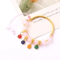 Pink moonstone bracelet with gold frame and Chinese characters for peace and joy - Ping An Xi Le Beaded Pink (K4552)