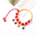 Adjustable golden rope bracelet with red beads and four colorful luck pendants - Ping An Xi Le Beaded Red (K4554)