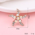 Starfish shaped jewelry accessory in rose gold with sparkling white and rainbow rhinestones - D325 Small Starfish Flower