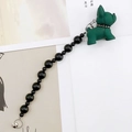 Detail of dark green matte french bulldog charm with black beaded strap and silver clasp - Green