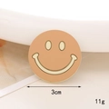Detailed view of 3cm round latte brown pearl smiley face DIY accessory with diamond inlay - Khaki Smile Face