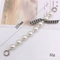 Cinturino per telefono in perle con fiocco pied-de-poule e anelli in metallo argento - 255mm / Stile Fiocco Bianco Crema