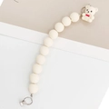 Creamy white beaded curtain tieback featuring a cute resin bear with a red bow detail - White Bear Magnetic Buckle (K703)