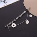Silver double-layer bracelet with floral charms and magnetic clasp on black background - Stainless Steel Plum Blossom Style (K1118)