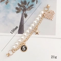 Double-layer pearl and gold chain bracelet featuring a woven heart and star charms - Pearl Double Chain / White And Gold (With Heart Charm)