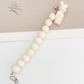Minimalist cream acrylic beaded bracelet featuring a matte bear charm and silver clasp - White Standing Bear (K705)