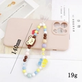 Dettaglio del laccetto per cellulare con perline colorate e ciondoli orso e ape su cover - Catena Cellulare Orso + Ape (K1053)
