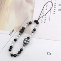 Handmade beaded phone charm with black bear, checkered cube, and colorful butterfly beads - Black and White Checkerboard Bear Phone Chain (K1030)