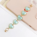 Detail of colorful acrylic heart beads with pearlescent finish and gold magnetic clasp - Colorful Blue