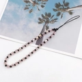 Detailed view of pink crystal beads and black spacer beads on a high-end phone wrist strap - Pink (K1014)