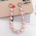 Lanière de téléphone en perles acryliques irisées roses avec fermoirs argentés - Déstockage (Rose) / Rose (K1024)