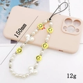Handgefertigte Handy-Perlenkette mit weißen Perlen, gelbem Smiley und Herzanhänger 150mm - Smiley Perle Herz Stil