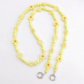 Detalle de cuentas de madera amarillas con diseños de flores y corazones para móviles - Amarillo (K1078)