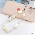 Beaded phone charm with pearlescent cat motifs and cream yellow striped round beads - Pearlescent Cat Head Style (K1091) / Off White