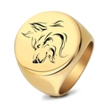 Detailed close-up of polished gold ring with a minimalist black wolf head engraving - US 7 / Gold Side Wolf