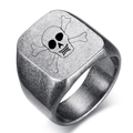 Macro detail of vintage stainless steel signet ring featuring a laser engraved skull motif - Vintage Square