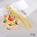 Detail view of yellow plush horse charm with embroidered text and acrylic lucky tags - Yellow Salary Boost Horse Style (K5883)