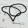 Detail of black braided neck lanyard with silver metal lobster clasp and square end cap - Black