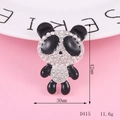 Detail of a sitting panda brooch with black enamel and white crystal rhinestones - Panda Style (D415)