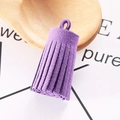 Macro shot of 3cm purple faux suede tassel pendant for DIY jewelry and keychains - Purple