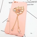 Pink phone case with gold peacock charm, rhinestones, and long metal tassels - D529 Peacock Tassel