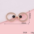 Detail view of gold glasses-shaped jewelry charm with black rhinestones and dimensions - Gold Glasses (D528)