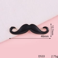 Detailed macro view of black enamel mustache accessory with 46mm x 12.7mm dimensions - Black Enamel Mustache (D533)