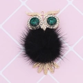 Detail of owl pendant with green rhinestone eyes and black fluffy fur ball charm - Black