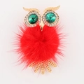 Golden owl car clip with green crystal eyes and a red fluffy pom-pom body accessory - Red