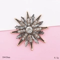 Detail view of a 39x39mm rose gold star brooch with grey marquise and white crystals - Grey Star Style (D1947)