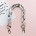 Macro shot of silver rectangular link chain strap with metallic lobster clasp closure - Hand Chain / Silver Square Handle Chain
