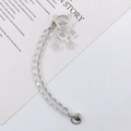 Primer plano del colgante de oso iridiscente y correa de cuentas para teléfono móvil - Estilo de Cadena de Cuentas con Oso Irisado / K150 Pulsera de Cristal con Oso
