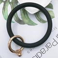 Practical black silicone wrist strap keychain with a golden metal spring buckle for women - Black