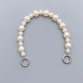 Detailed view of white pearl handbag strap with silver spring buckles for DIY phone cases - 10mm+14mm Pearl Handle Chain (21 Beads) (K339)