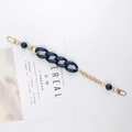 Detail of blue marble acrylic chain with gold metal links and lobster clasps for bags - Hand Chain / K496 Dark Blue Hand Strap