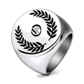Macro shot of polished stainless steel signet ring with engraved laurel leaf design - Letter O