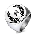 Macro detail of silver stainless steel signet ring with gothic letter S and laurel wreath - Letter N
