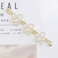Hollow gold flower chain bracelet made of zinc alloy with polished metal finish - Hollow Flower Bracelet (K499-Matte Gold)