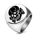 Punk style stainless steel ring featuring a round flat face with a black skull and crossbones - US 7 / Steel