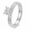 Macro view of a 3mm silver zircon ring featuring a classic four-prong set round diamond - US 7 / Four Claw Solitaire Style (CG1844) - Steel