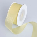2.5cm pale yellow matte sheer organza ribbon on a white spool for DIY wedding decor - Yellow
