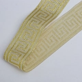 Cinta tejida étnica vintage con patrón de greca griega en oro y crema para ropa - Dorado Brillante