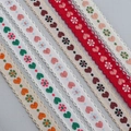 Detail of 15mm jacquard heart lace ribbons with floral embroidery and scalloped edges - Customizable Other Colors