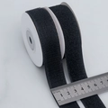 Black 20mm hook and loop tape roll for cable management on a white cardboard core - Black (2.5cm)