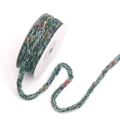 Dark green tweed braided cord with colorful specks on a white spool for DIY crafts - Green