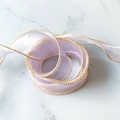 Light purple chiffon ribbon with gold metallic edges coiled on marble surface - Gold Edge Purple (6 Yards) / 4cm