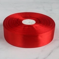 Single roll of red satin ribbon with glossy finish on a white marble surface - 4cm x 91m