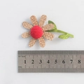 Handmade jute flower with red center and green leaves, measuring 4cm diameter for DIY crafts - Small Burlap Flower